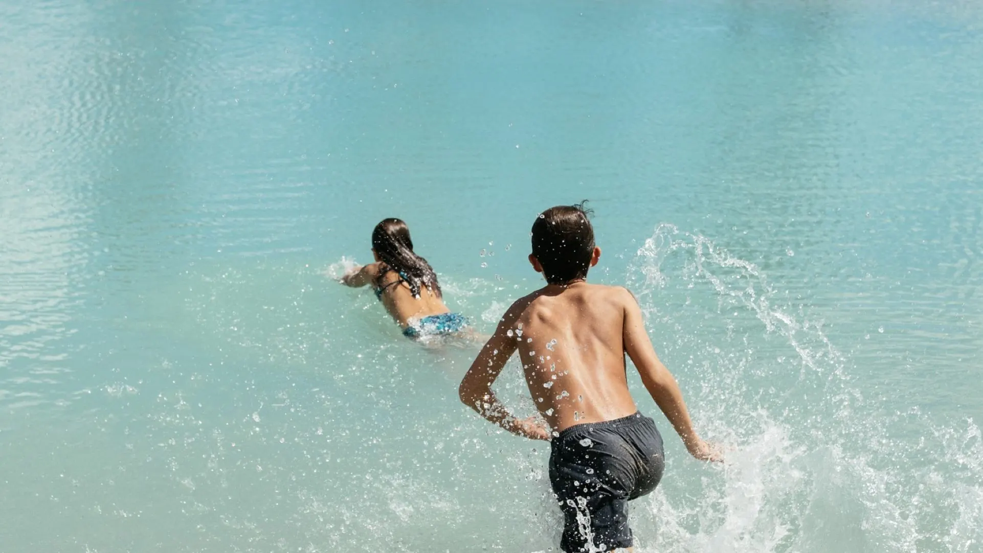 Children playing in the lagoon