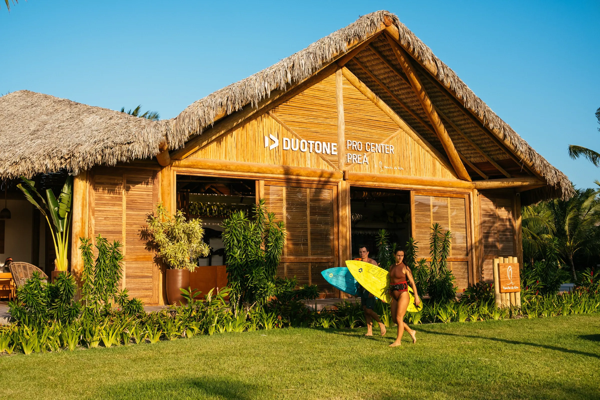 The Duotone Pro Center building, with riders carrying kite boards
